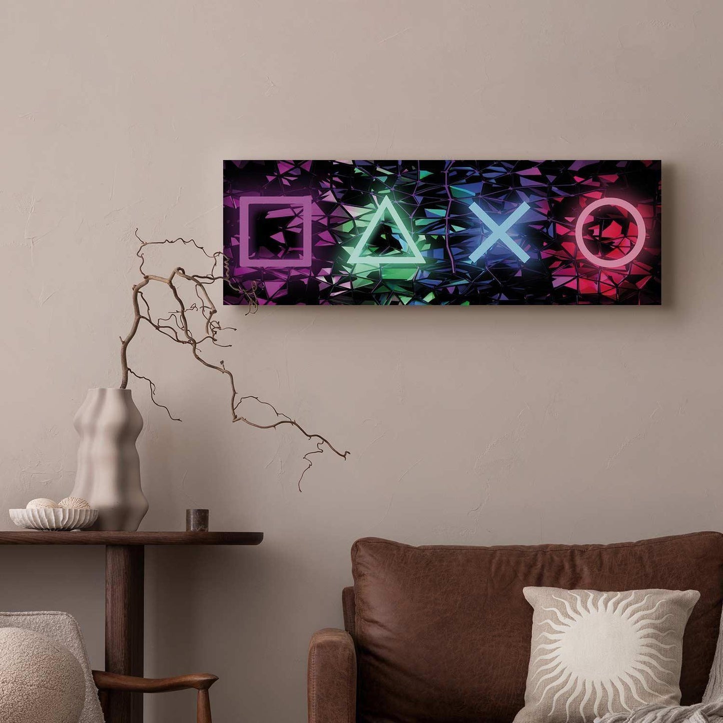 Canvas print with fun symbols in vibrant colors decorating a modern living room wall.