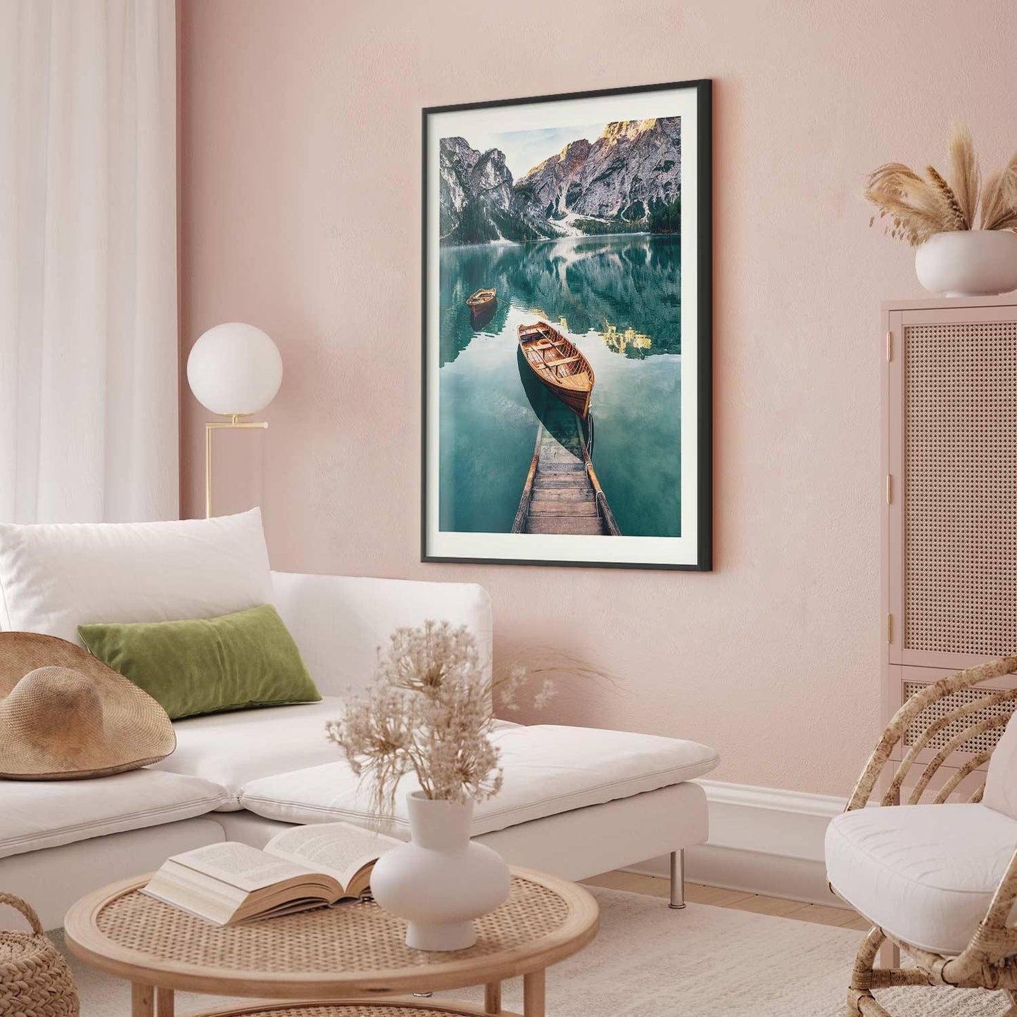 Poster featuring boats in the Dolomites, displayed in a cozy living room setting.