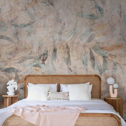 Fototapete - Greek laurels - faded composition with leaves on a beige patterned background