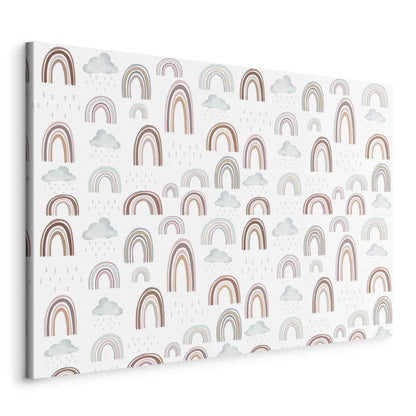 Leinwandbild - Rainbows After the Storm - Rainbows of Various Sizes in Pastel Hues Among Rain Clouds in a Gray-Blue Shade