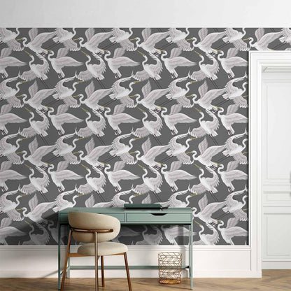 Tapete - Flying birds – a delicate pattern of white and grey herons on a grey background