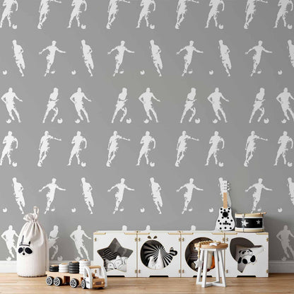 Tapete - Sports Silhouettes - Dynamic figures of soccer players on a gray background