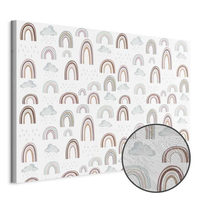 Leinwandbild - Rainbows After the Storm - Rainbows of Various Sizes in Pastel Hues Among Rain Clouds in a Gray-Blue Shade