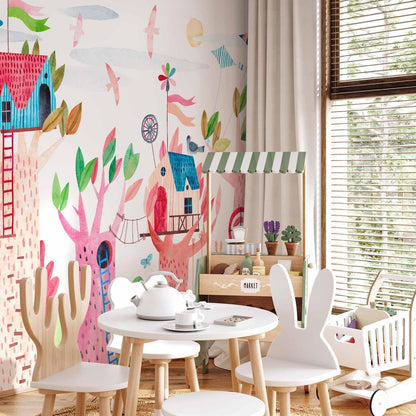 Fototapete - Painted tree houses - a colourful fantasy with kites for children