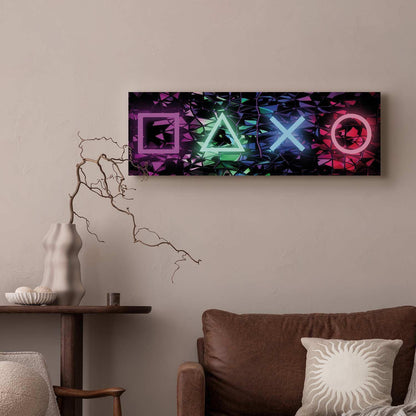 Canvas print with fun symbols in vibrant colors decorating a modern living room wall.