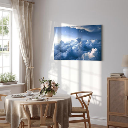 Leinwandbild - Aerial Landscapes: Rays Lighting Up Fluffy Cloud Formations