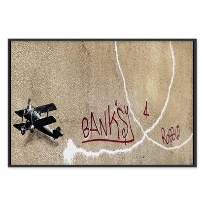 Leinwandbild - Banksy's Plane (1-part) - Red Graffiti Text on Mural Background