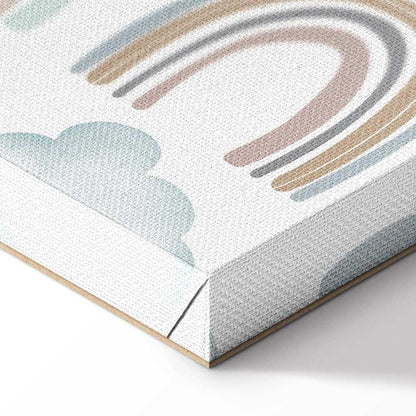 Leinwandbild - Rainbows After the Storm - Rainbows of Various Sizes in Pastel Hues Among Rain Clouds in a Gray-Blue Shade