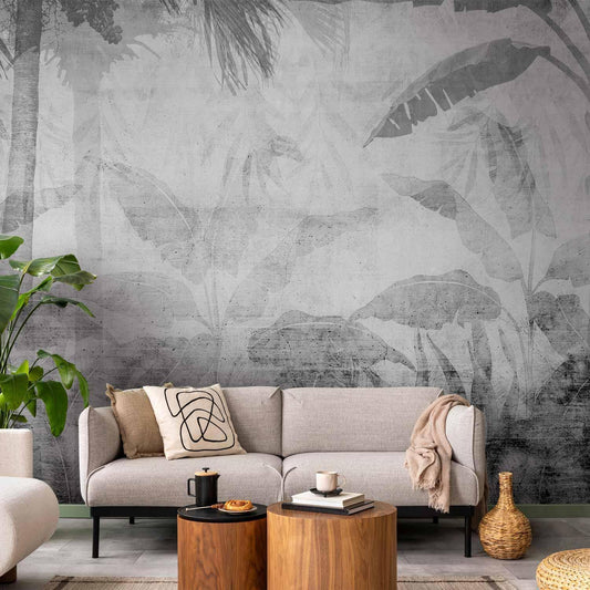 Fototapete - Vanishing jungle - landscape of exotic trees and leaves in grey tones Artgeist