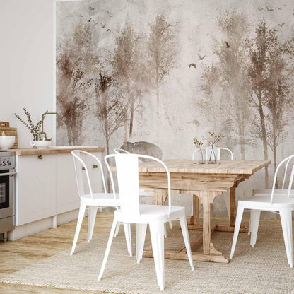 Fototapete - Among the trees - landscape in grey tones in fog in a clearing with birds