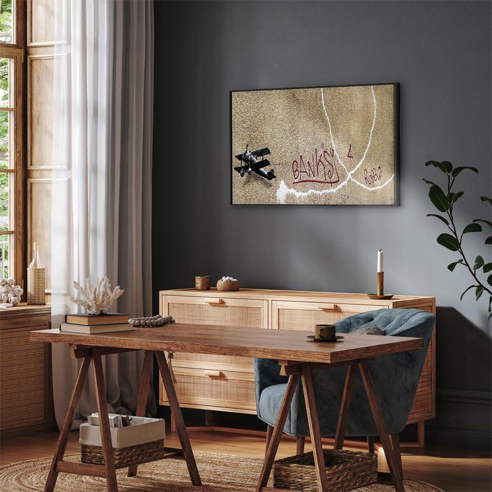 Leinwandbild - Banksy's Plane (1-part) - Red Graffiti Text on Mural Background