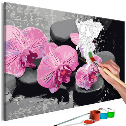 Wandbild zum Ausmalen Orchid With Zen Stones Dekoration - elegante Orchidee mit Zen-Steinen auf schwarzem Hintergrund als Wandschmuck