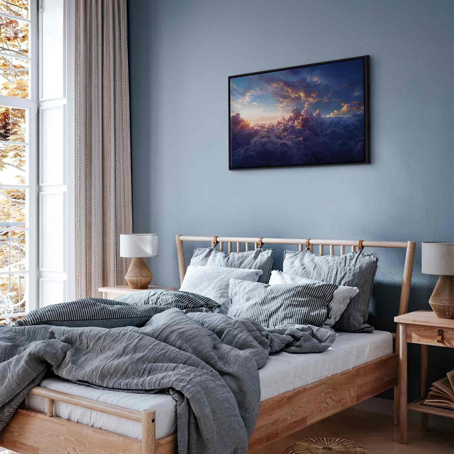 Leinwandbild - The Sun in Hiding: The Golden Face of the Sky Over a Cloudy Sea Artgeist
