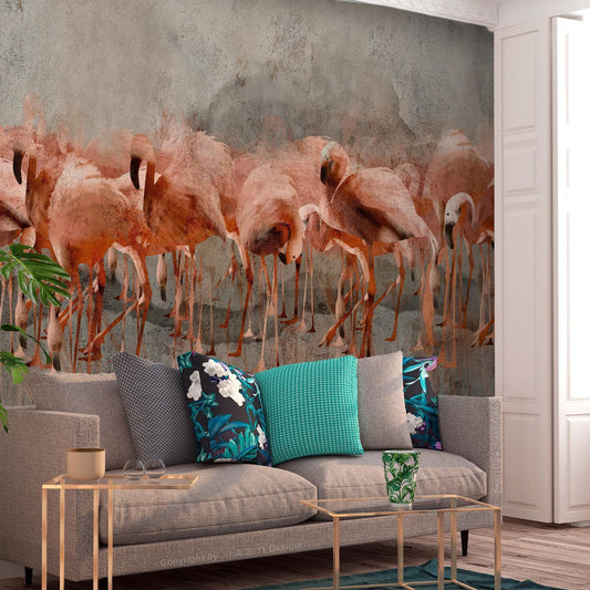 Fototapete - Exotic birds - pink flamingos with shadow on grey concrete background Artgeist