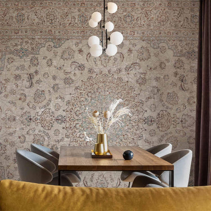 Fototapete - Sand carpet - worn Persian carpet with rich decorative motifs