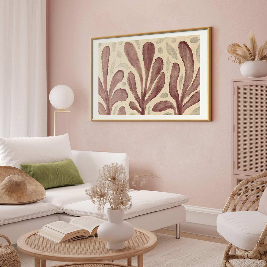 Poster featuring large trembling leaf shapes with spots, inspired by Matisse, in a modern living room setting.