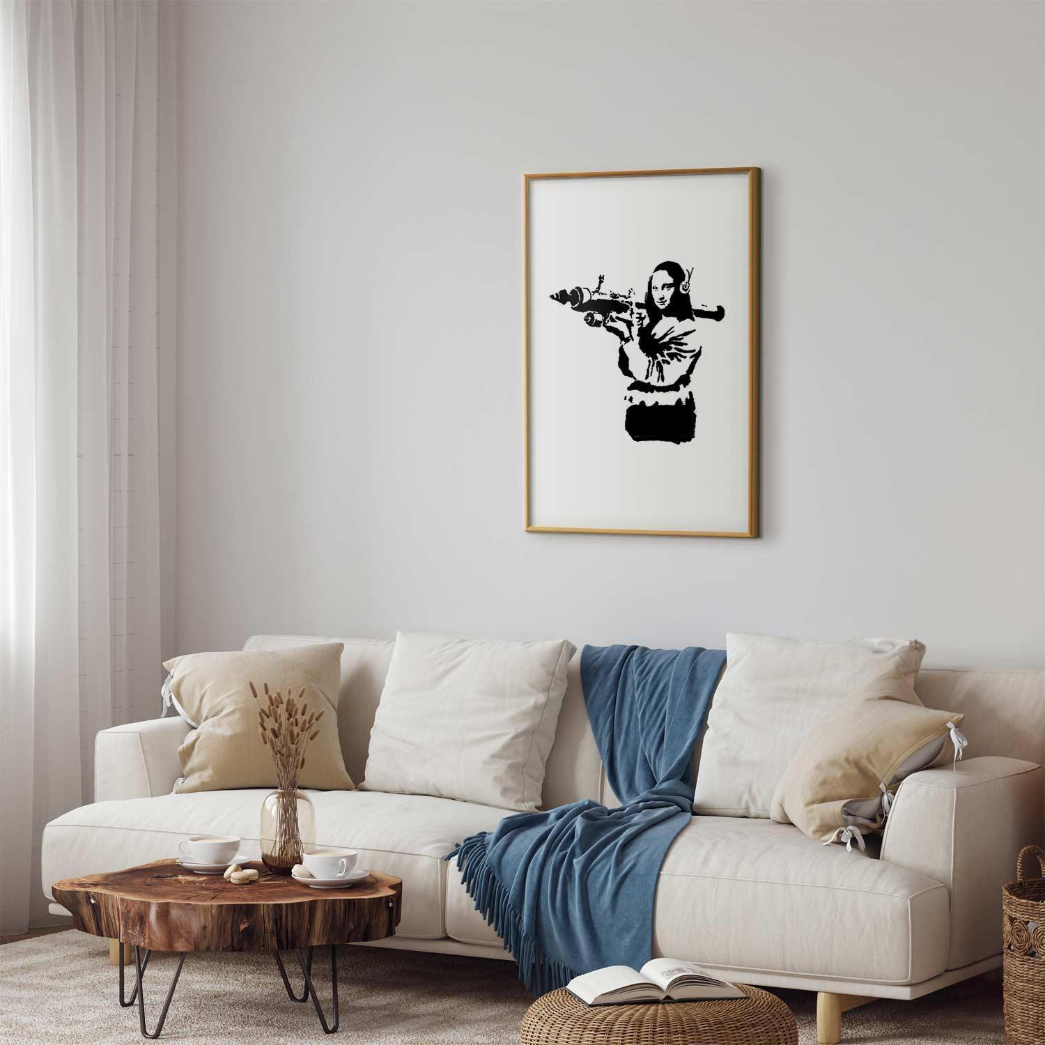 Poster of Banksy's Mona Lisa with Rocket Launcher in modern living room setting.