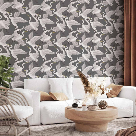 Tapete - Flying birds – a delicate pattern of white and grey herons on a grey background
