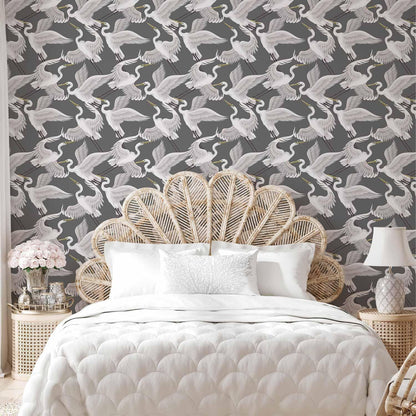 Tapete - Flying birds – a delicate pattern of white and grey herons on a grey background