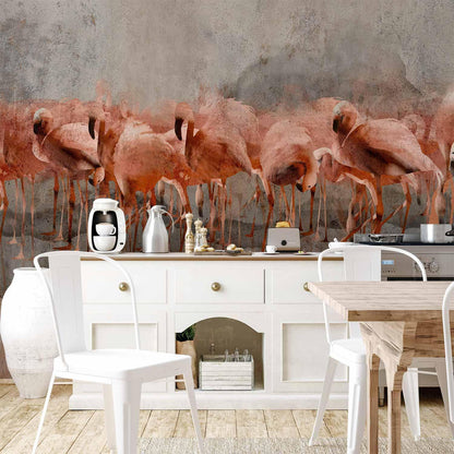 Fototapete - Exotic birds - pink flamingos with shadow on grey concrete background Artgeist