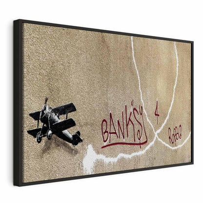 Leinwandbild - Banksy's Plane (1-part) - Red Graffiti Text on Mural Background