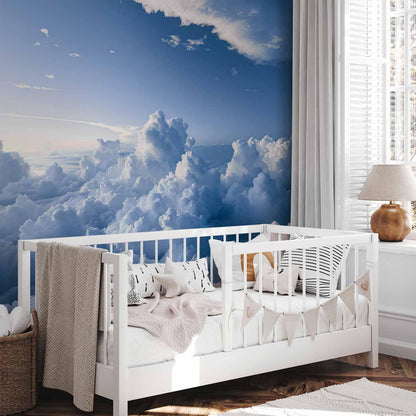 Fototapete - Aerial Landscapes: Rays Lighting Up Fluffy Cloud Formations