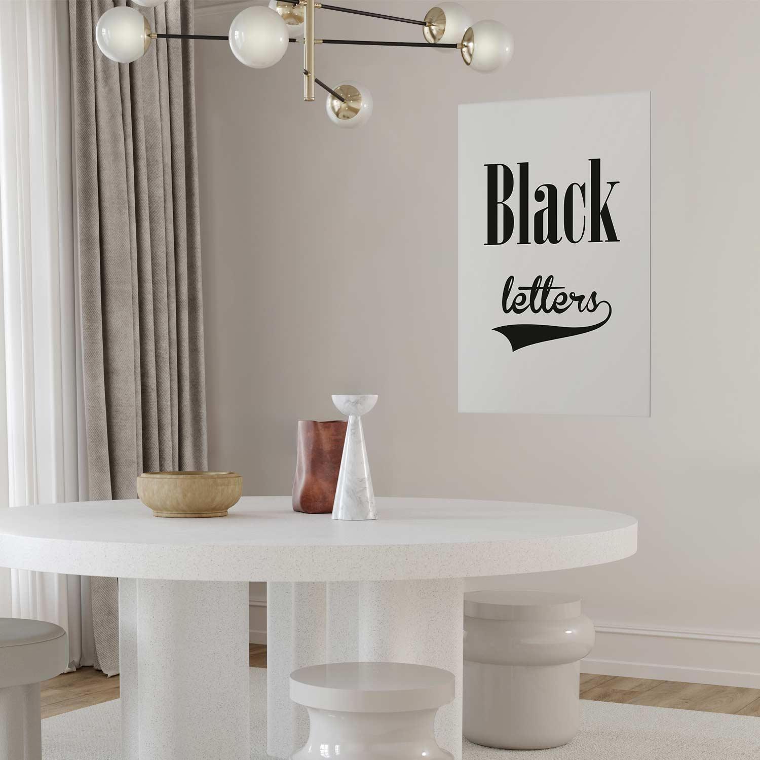 Poster displaying black letters in a modern interior design setting.