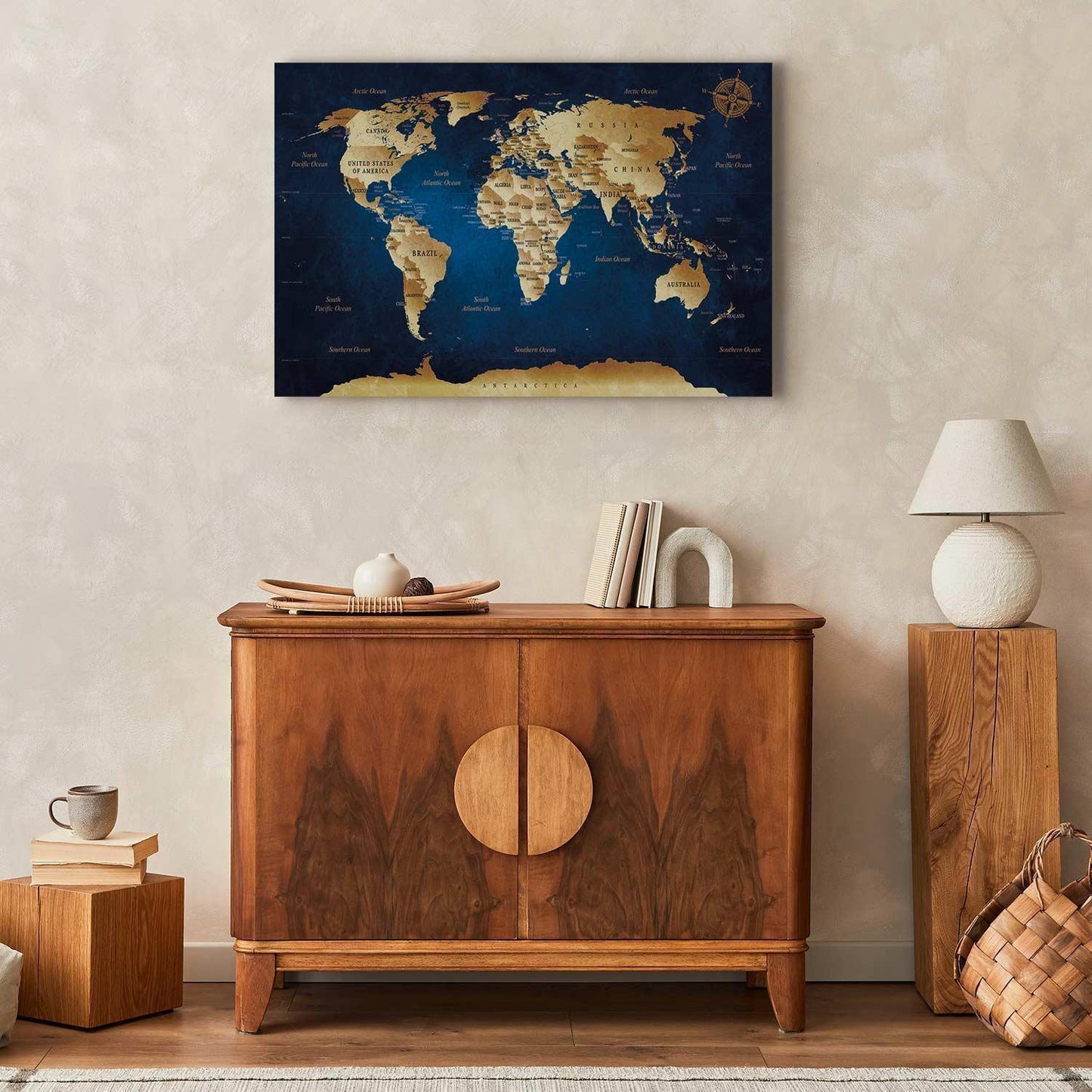 Canvas art piece titled "World Map: The Dark Blue Depths" displayed above a wooden console in a stylish room.