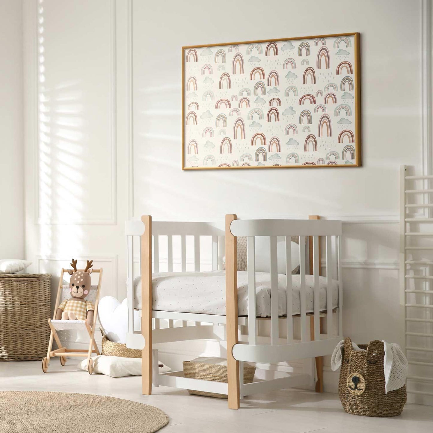 Framed poster featuring rainbow pattern hanging above white baby crib in a cozy nursery room.