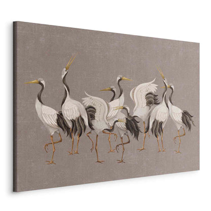 Leinwandbild - Crane dance – bright silhouettes of birds against a warm grey background with texture
